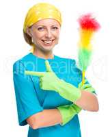 Young woman as a cleaning maid