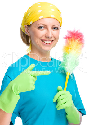 Young woman as a cleaning maid