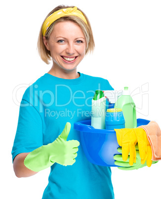 Young woman as a cleaning maid