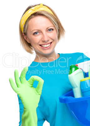 Young woman as a cleaning maid