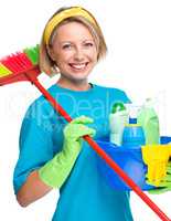 Young woman as a cleaning maid