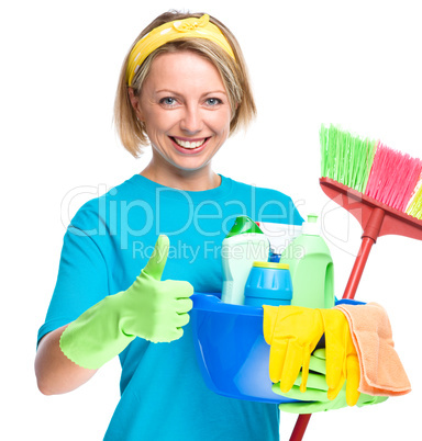 Young woman as a cleaning maid