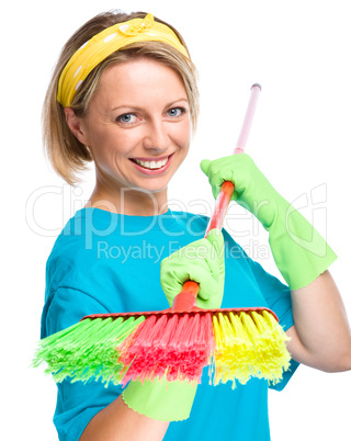 Young woman as a cleaning maid