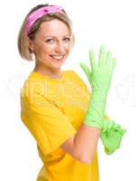 Young woman as a cleaning maid