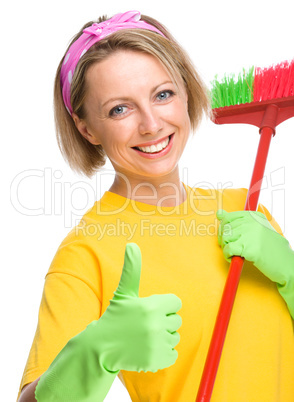 Young woman as a cleaning maid