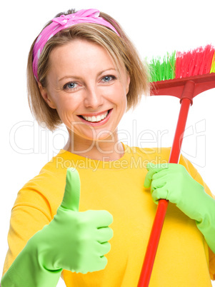 Young woman as a cleaning maid