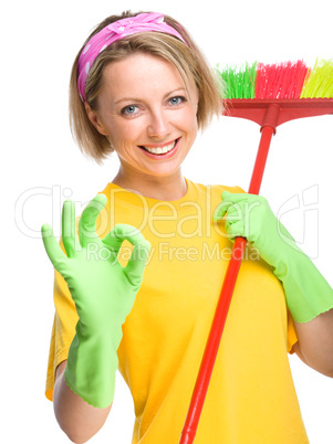 Young woman as a cleaning maid