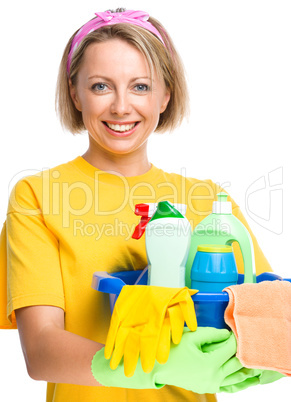 Young woman as a cleaning maid