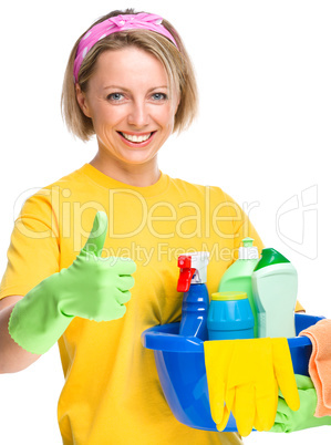 Young woman as a cleaning maid Young woman as a cleaning maid