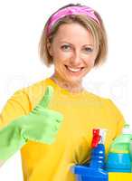 Young woman as a cleaning maid