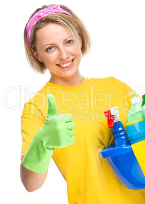Young woman as a cleaning maid Young woman as a cleaning maid