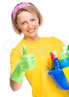 Young woman as a cleaning maid