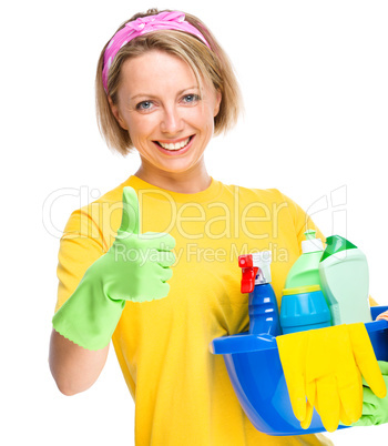 Young woman as a cleaning maid