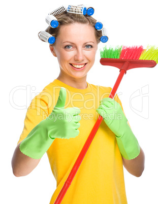 Young woman as a cleaning maid