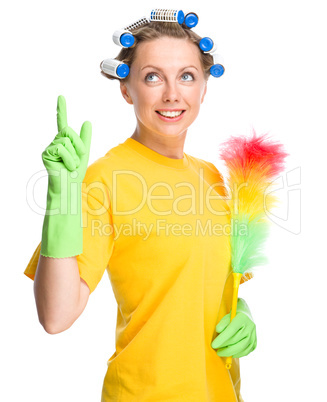 Young woman holding static duster