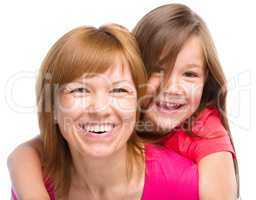 Portrait of a happy mother with her daughter