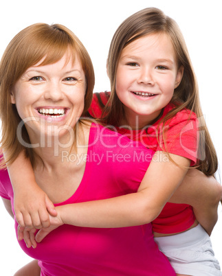 Portrait of a happy mother with her daughter