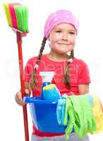 Young girl is dressed as a cleaning maid