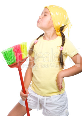 Young girl is dressed as a cleaning maid