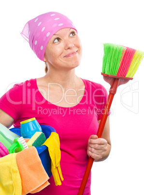 Young woman is dressed as a cleaning maid