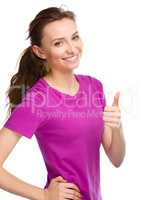 Woman is showing thumb up gesture