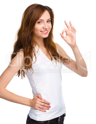 Woman is showing OK sign