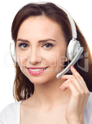 Lovely young woman is talking to customers