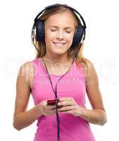 Teen girl enjoying music using headphones