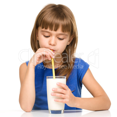 Cute little girl with a glass of milk