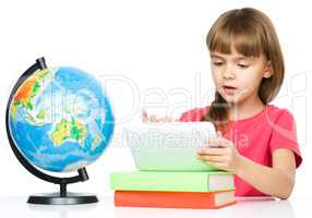 Young girl is using tablet