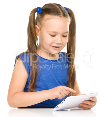 Young girl is using tablet