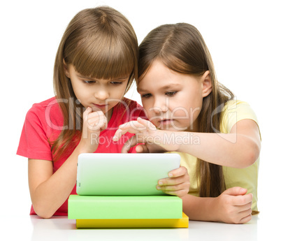 Children are using tablet