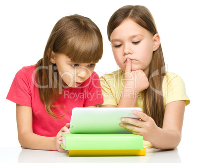 Children are using tablet