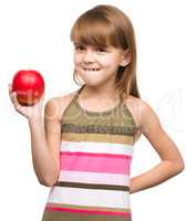 Little girl with red apple