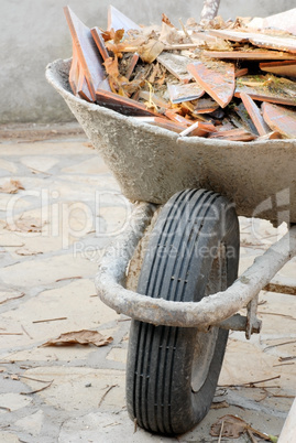 Wheelbarrow with waste