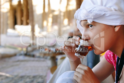 Girl drinking orient tea