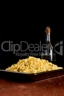 Risotto with Saffron on wooden table