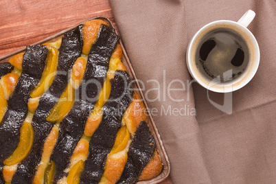 Coffee and cake with poppy seeds and orange