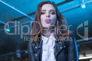 pretty woman smoking e-cigarette
