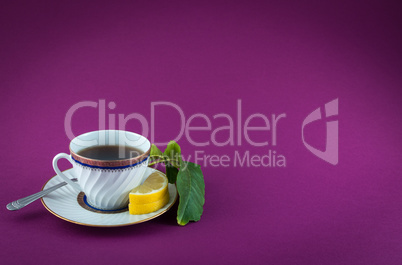 Tea cup on colored background