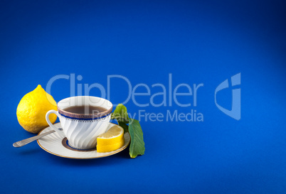 Tea cup on colored background