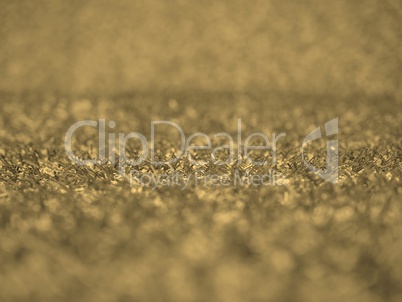 Artificial synthetic grass meadow background sepia