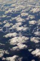 Top view on clouds and fields