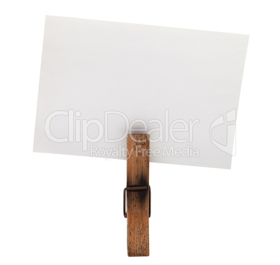 Wooden old clothespin and empty card