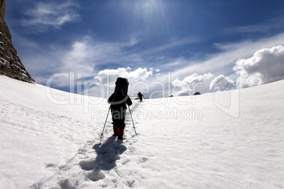 Two hikers on snow plateau