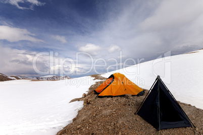 Tents in snow mountains