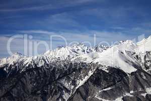 View on snowy mountains in sun day