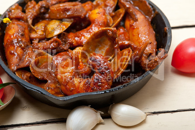 fresh seafoos stew on an iron skillet