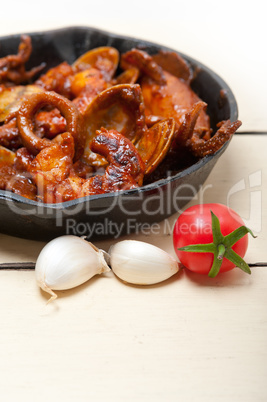 fresh seafoos stew on an iron skillet