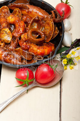 fresh seafoos stew on an iron skillet